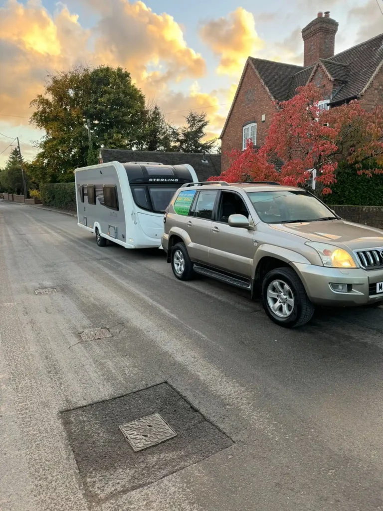 Compact touring caravan towed by a hatchback